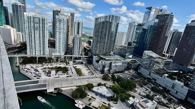 property's view of city with a water view