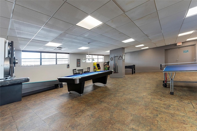 rec room with pool table, a drop ceiling, and a wealth of natural light