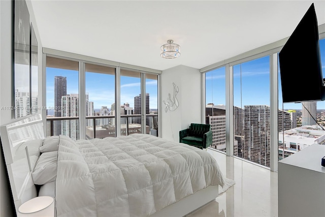 bedroom featuring a wall of windows