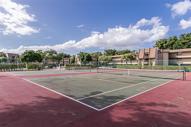 view of tennis court with basketball court