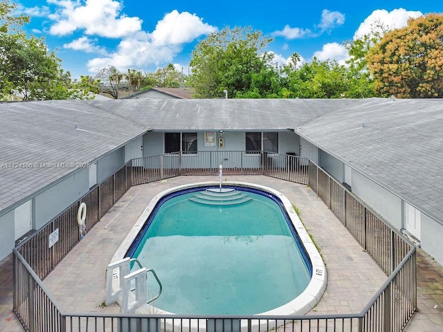 view of pool featuring a patio area