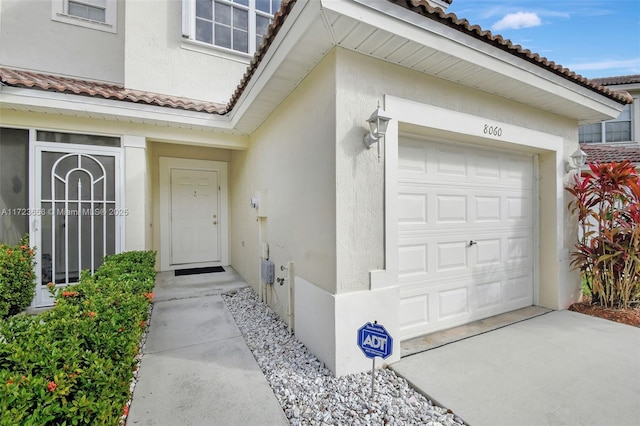 property entrance featuring a garage