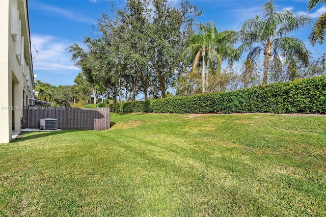 view of yard with central AC