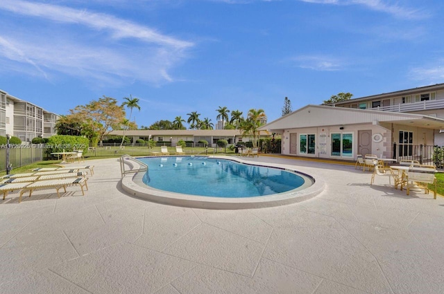 view of pool featuring a patio