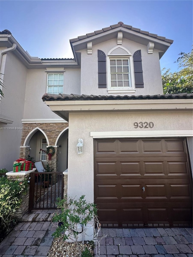 view of front of home featuring a garage