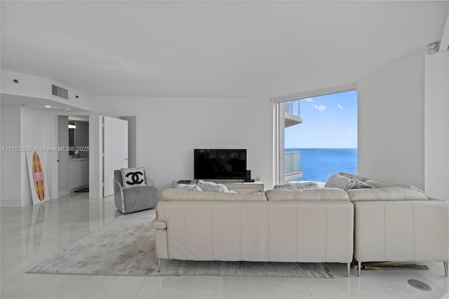 living room with floor to ceiling windows