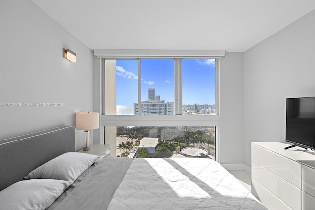 bedroom featuring multiple windows