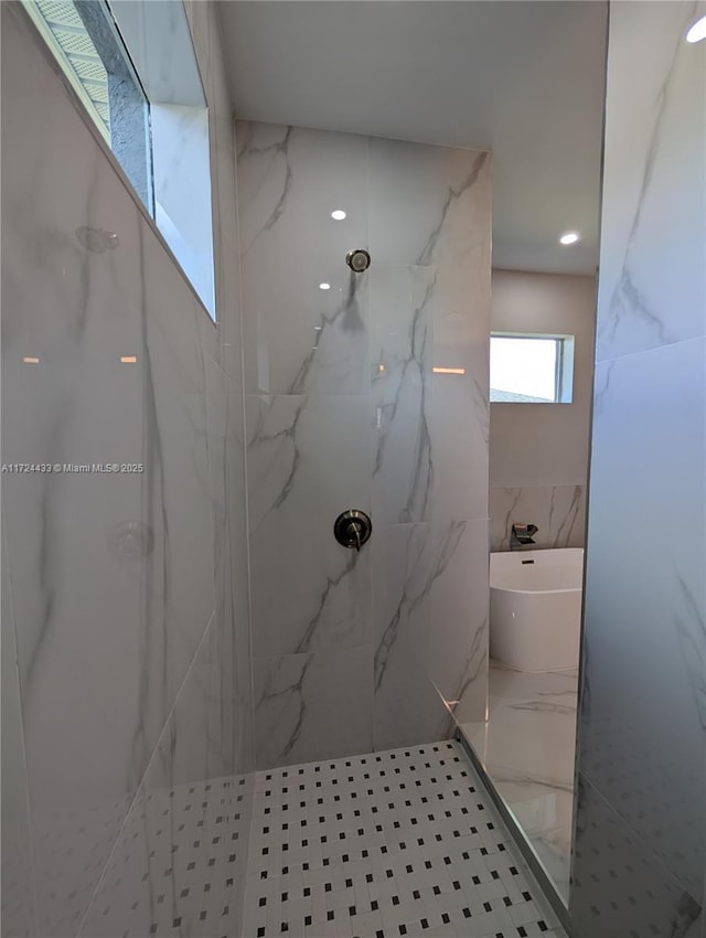 bathroom with independent shower and bath