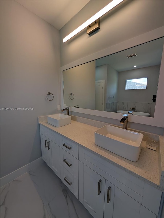 bathroom featuring vanity