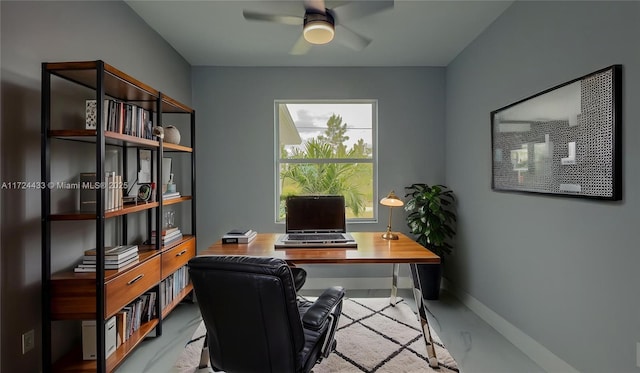 office space featuring a ceiling fan