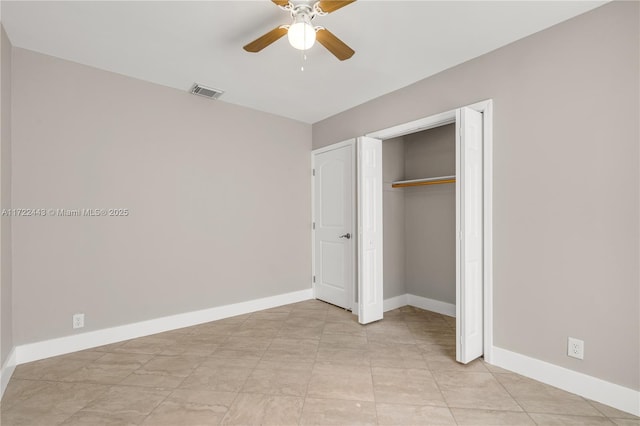 unfurnished bedroom featuring a closet and ceiling fan