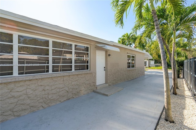 view of home's exterior featuring a patio