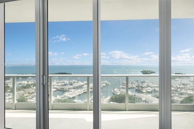 interior space featuring a water view and a wealth of natural light