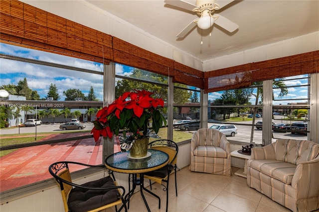 sunroom / solarium with ceiling fan