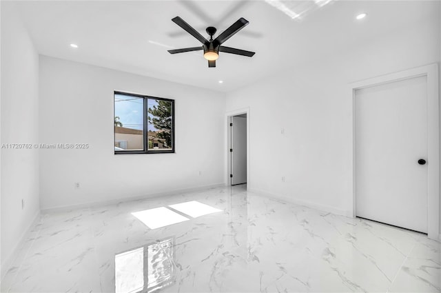 empty room featuring ceiling fan