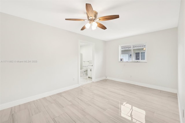 spare room featuring ceiling fan