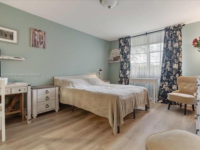 bedroom featuring light hardwood / wood-style flooring