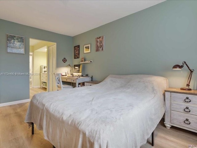 bedroom with light hardwood / wood-style floors