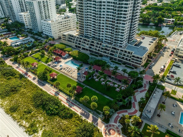 birds eye view of property with a water view