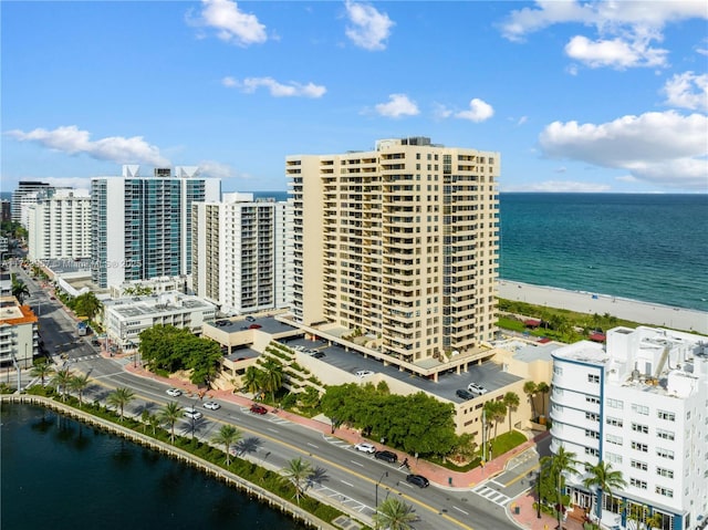 aerial view featuring a beach view and a water view