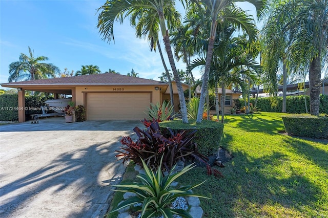 view of front facade featuring a front yard and a carport