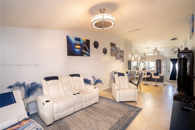 tiled living room with lofted ceiling