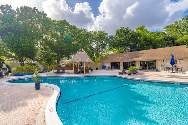 view of swimming pool with a gazebo and a patio area