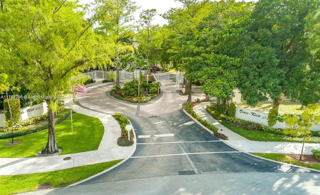 surrounding community featuring a lawn