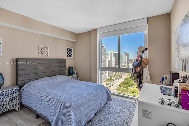 bedroom featuring hardwood / wood-style floors