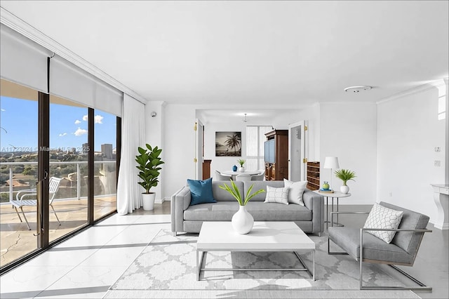 living room with marble finish floor, crown molding, and baseboards