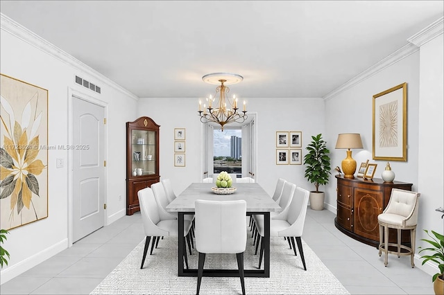 dining room with light tile patterned floors, baseboards, visible vents, ornamental molding, and a notable chandelier