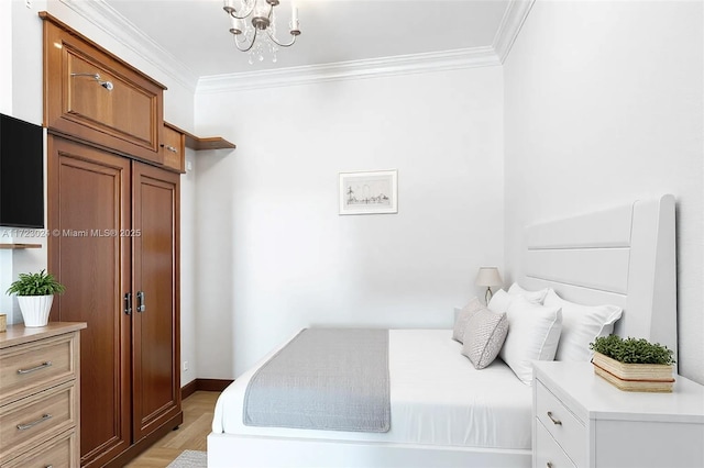 bedroom featuring crown molding, a notable chandelier, and baseboards