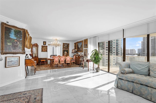 living room featuring crown molding, baseboards, a chandelier, marble finish floor, and a view of city