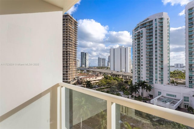 balcony featuring a city view