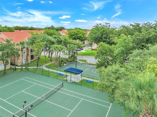 view of sport court featuring basketball hoop