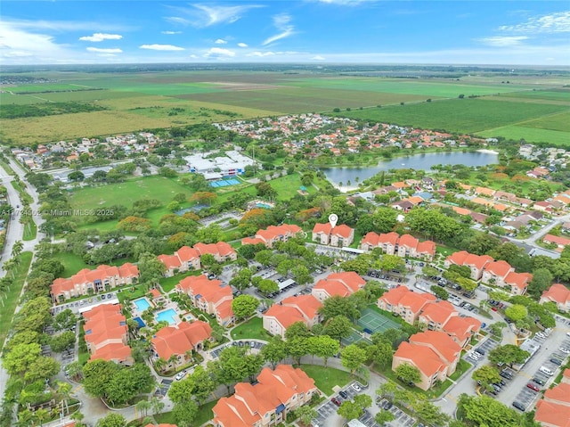 drone / aerial view with a rural view and a water view