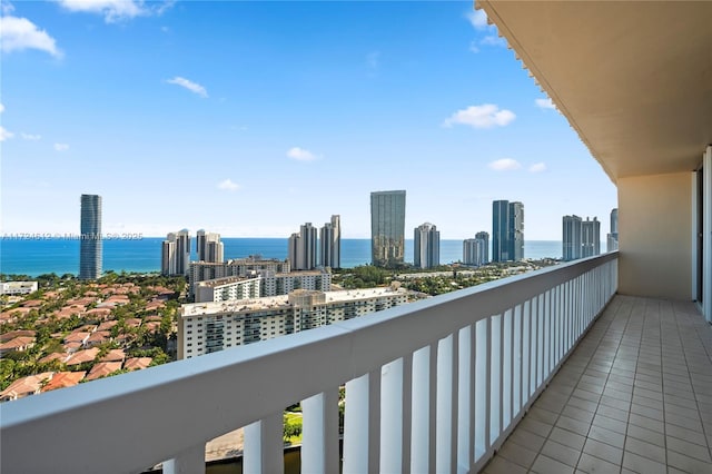 balcony featuring a water view