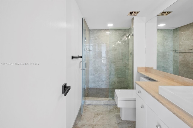 bathroom with walk in shower, vanity, and toilet