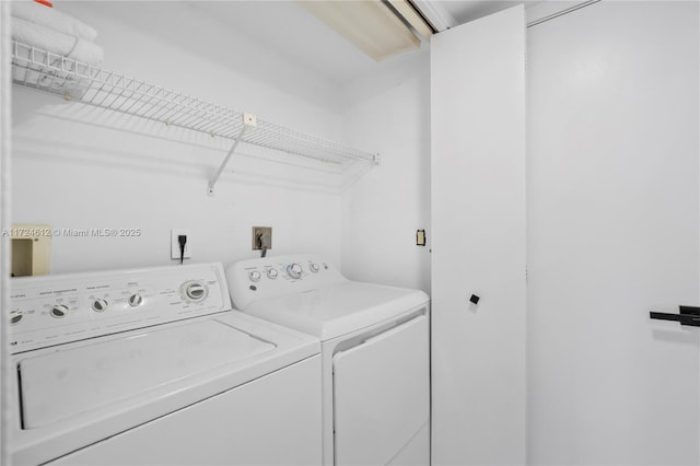 laundry area with washer and dryer