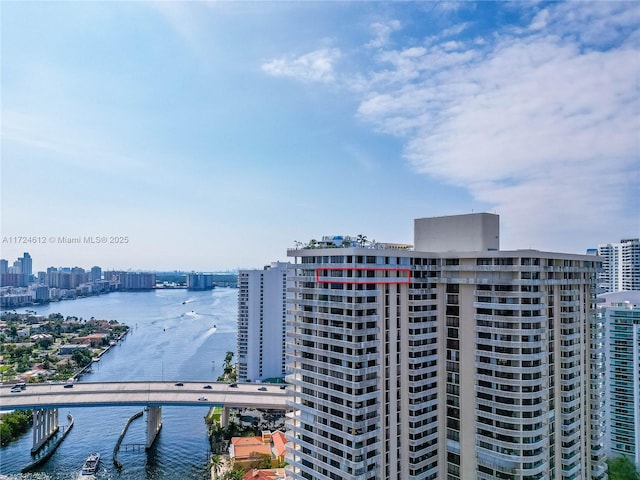 exterior space featuring a water view and central AC unit