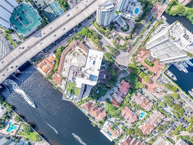 drone / aerial view with a water view