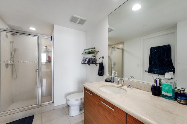 bathroom with walk in shower, tile patterned flooring, vanity, and toilet