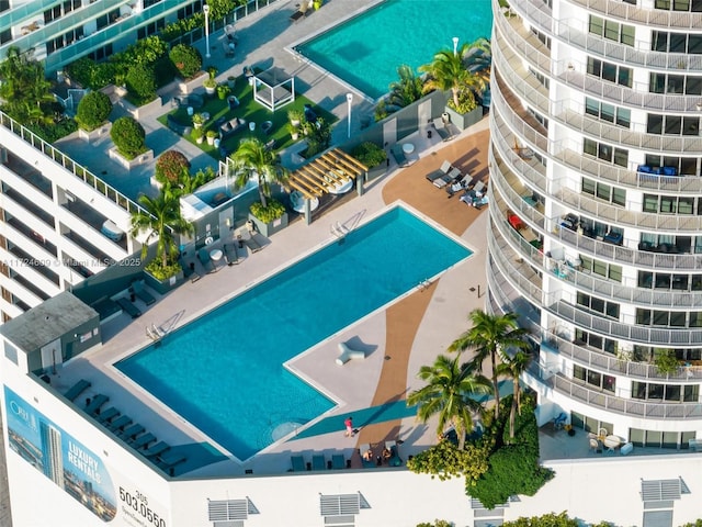 view of swimming pool with a patio area