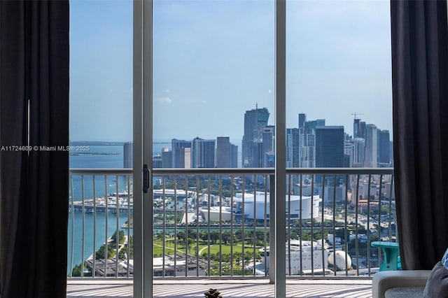 balcony featuring a water view