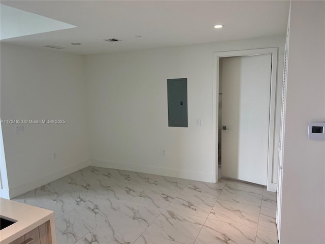 unfurnished room with electric panel