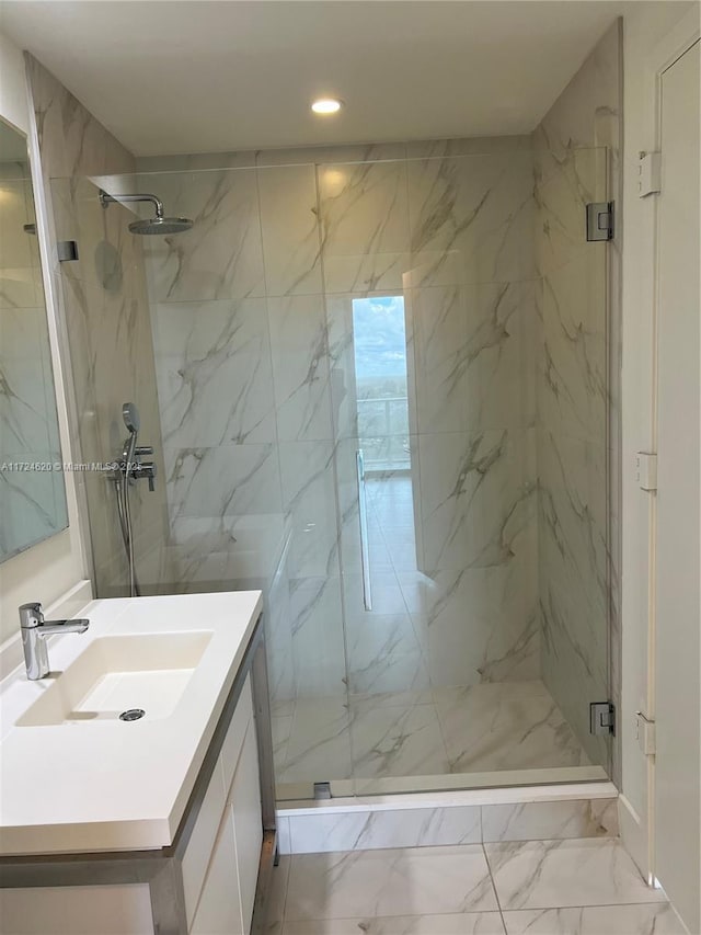 bathroom featuring vanity and walk in shower