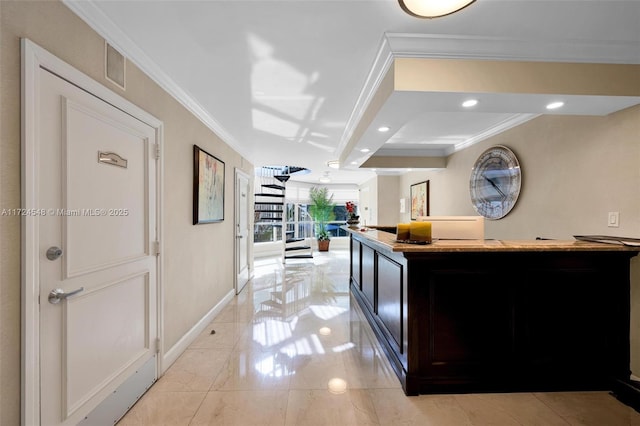 interior space featuring crown molding