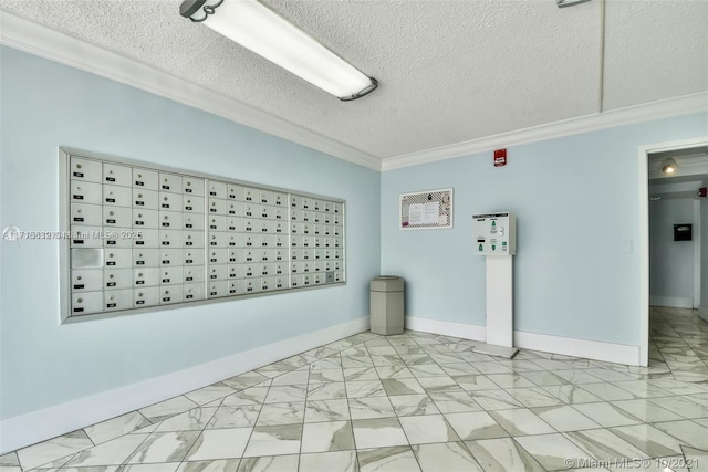 unfurnished room featuring crown molding, a textured ceiling, marble finish floor, and mail area