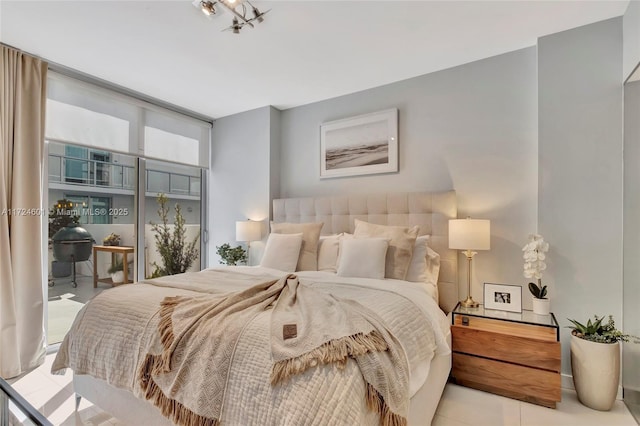 bedroom with a wall of windows