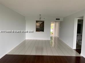 spare room with light tile patterned floors